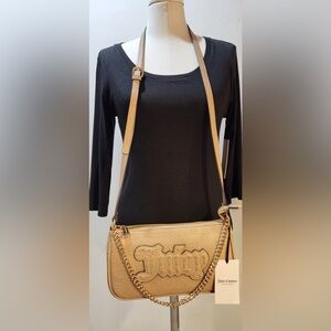 JUICY COUTURE tan House of Juicy crossbody bag.